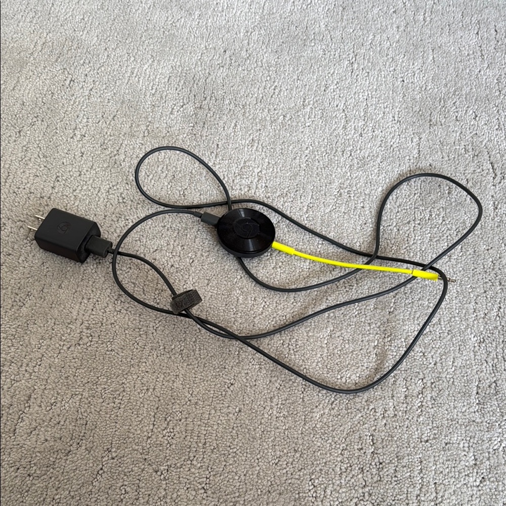 Black and Yellow Chrome Cast Streaming Device with Charger
